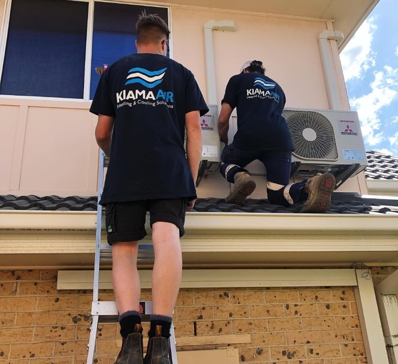 Two Man Installing Air-condition — Kiama Air Conditioning in Albion Park Rail, NSW